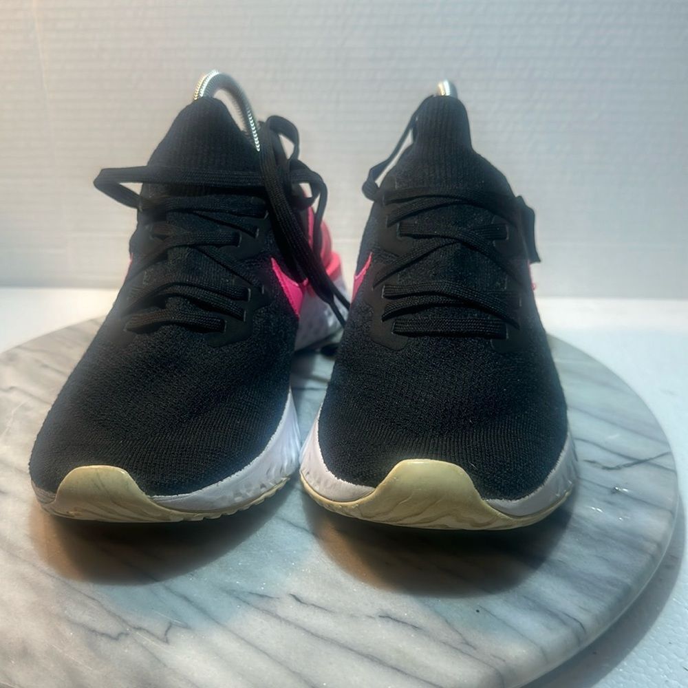 Nike black and pink running shoes